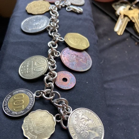 925 sterling silver coin charm bracelet 11 of them on here milor bracelet